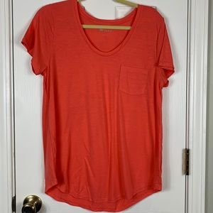 Stylus peach colored short sleeved tee shirt size large. Has a pocket